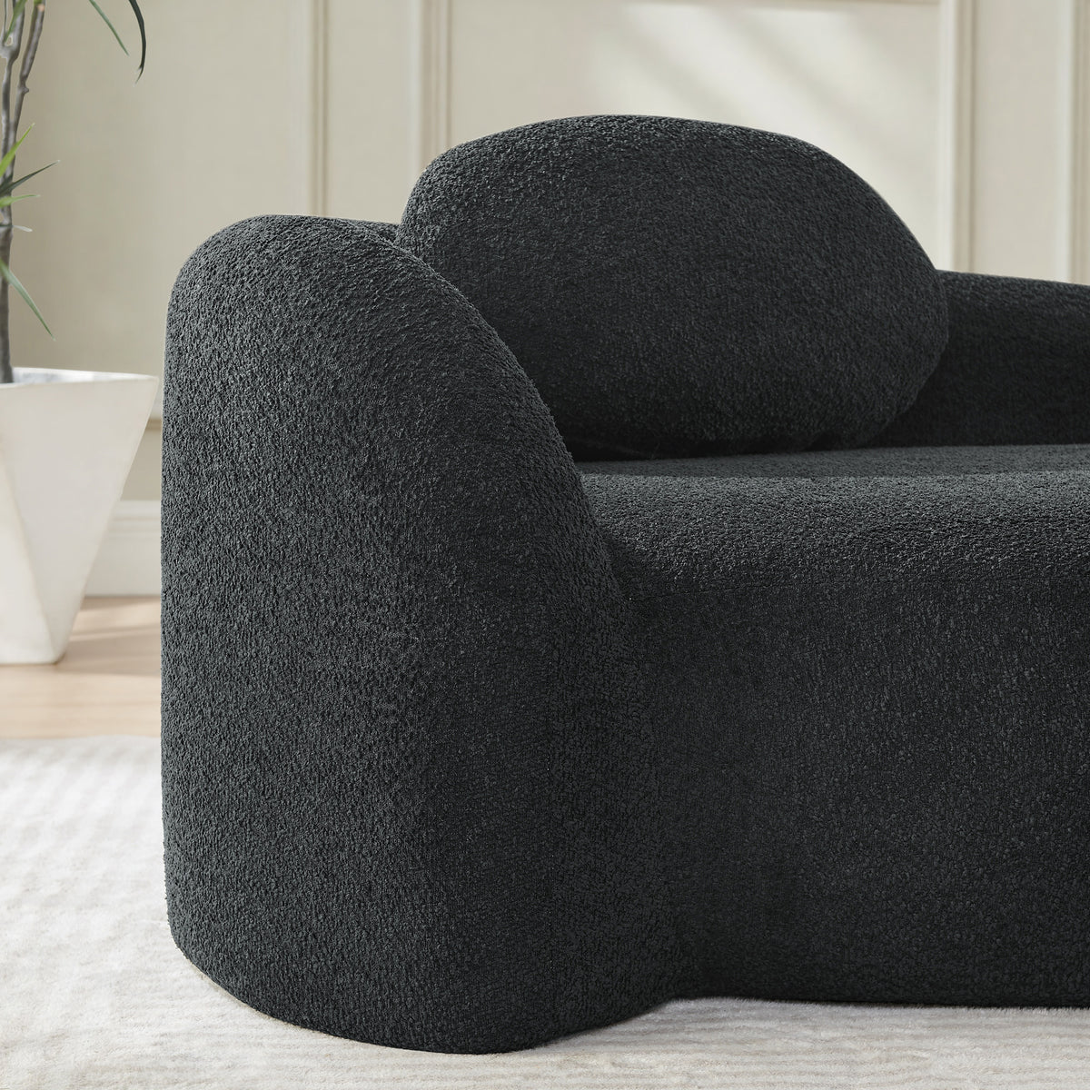 Close-up detail of Accent Chair Backrest & Pillow Black Bouclé Fabric 1-Seater
