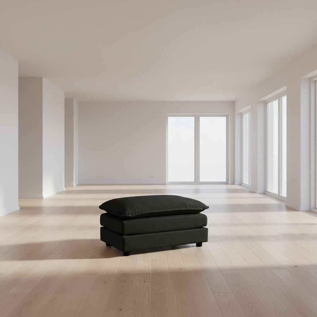 Ottoman Cushioned Footrest Black Chenille in a modern living room