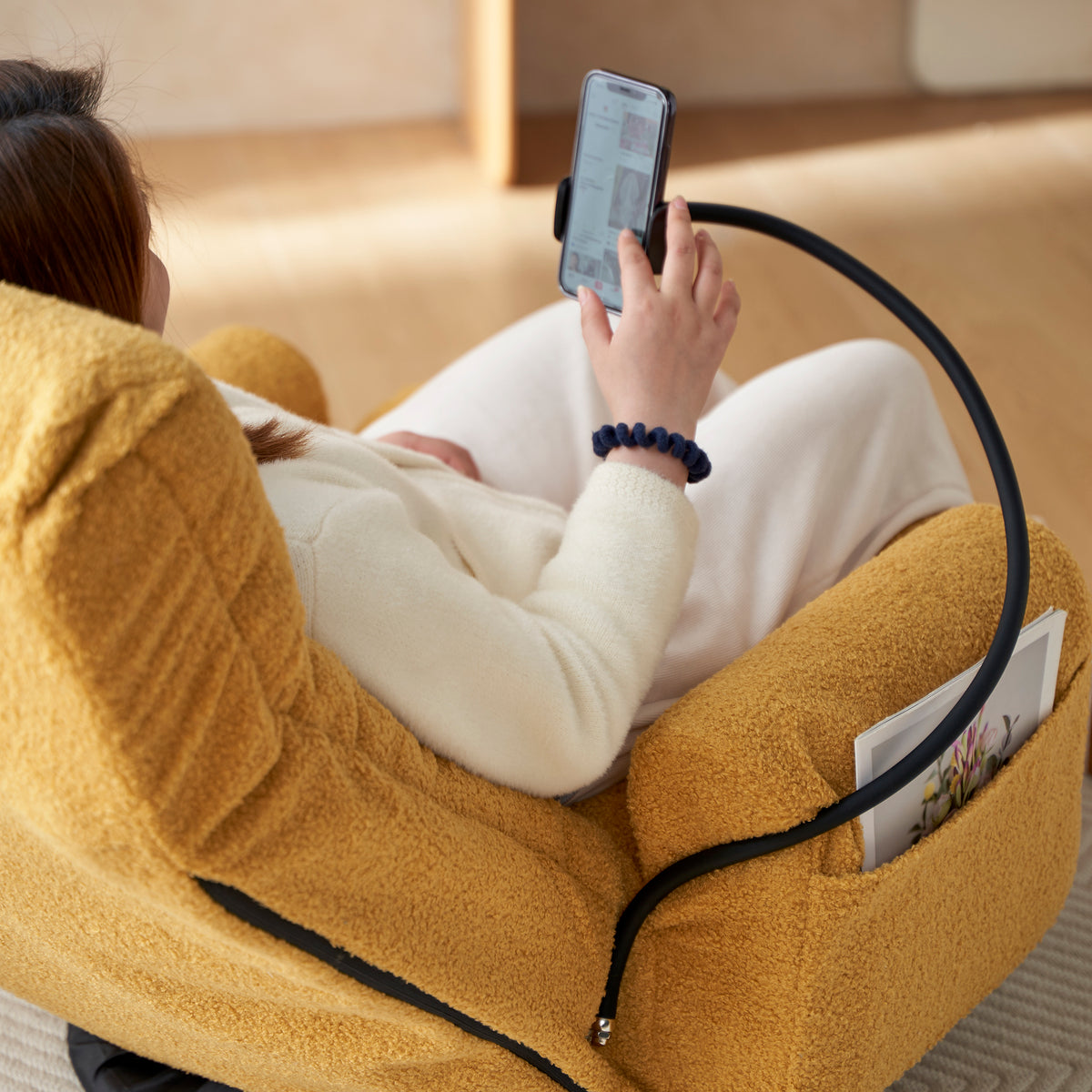 Close-up detail of Swivel Lounge Chair 360° Swivel & Headrest Yellow Metal
