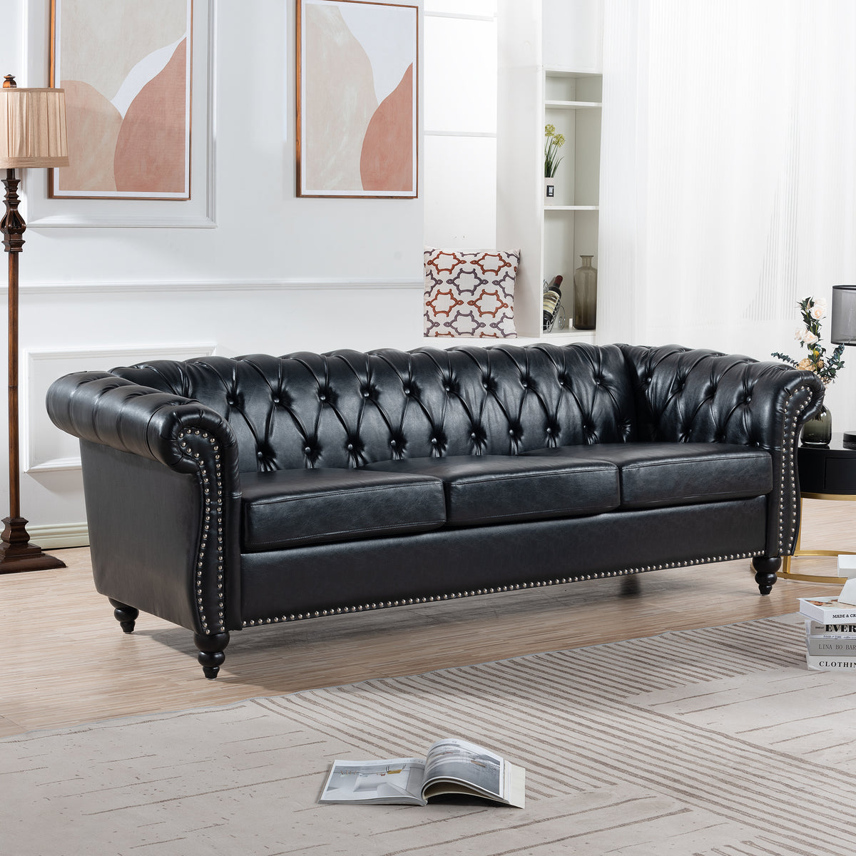 Sofa Chesterfield Cushioned Seating Black PU Leather 3-Seater in a modern living room