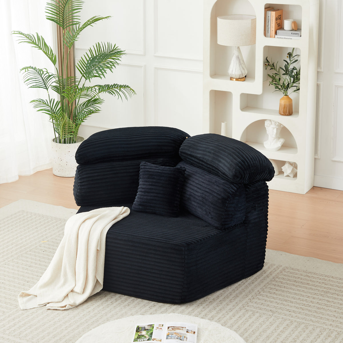 Lounge Chair Modern Cushioned Seating Black Corduroy 1-Seater in a modern living room