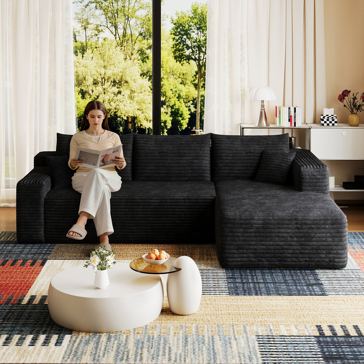 Sectional Sofa Modular Sectional Black Corduroy in a modern living room