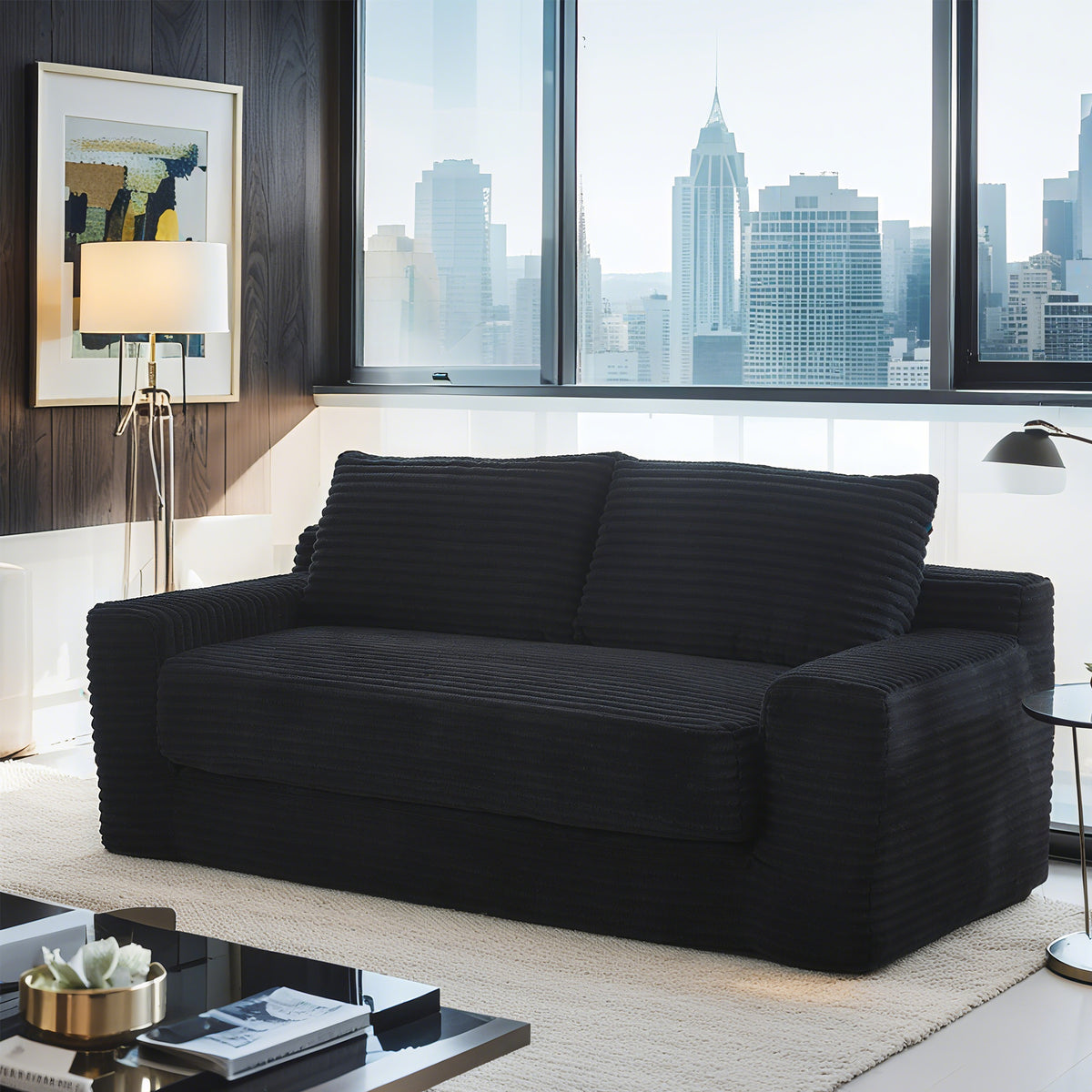 Loveseat Sofa Convertible Sleeper Black Fabric 2-Seater in a modern living room