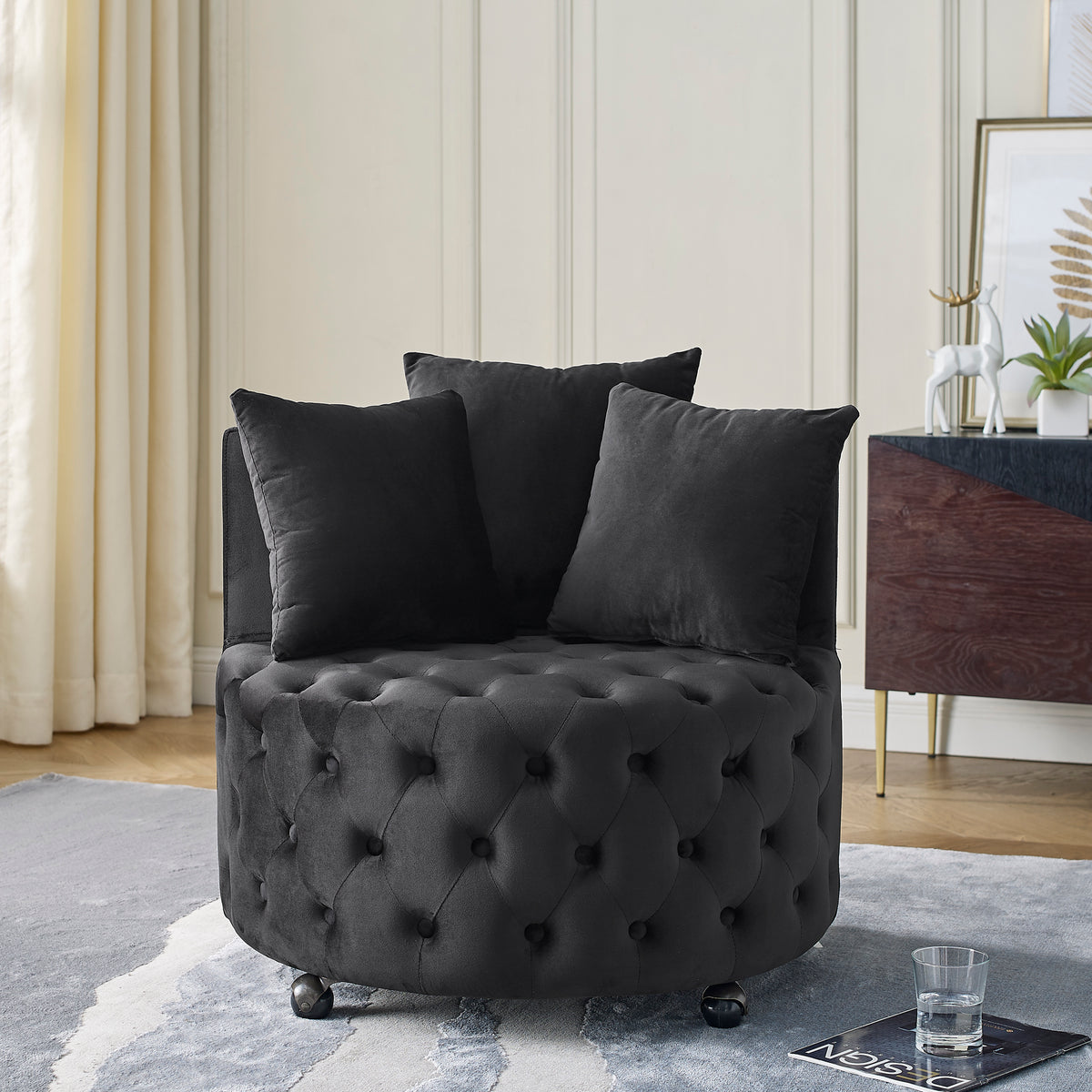 Accent Chair Modern Glam Tufted Swivel & Wheels Black Velvet in a modern living room